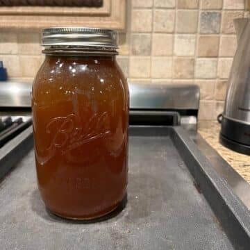 Bone Broth in Mason Jar on stove