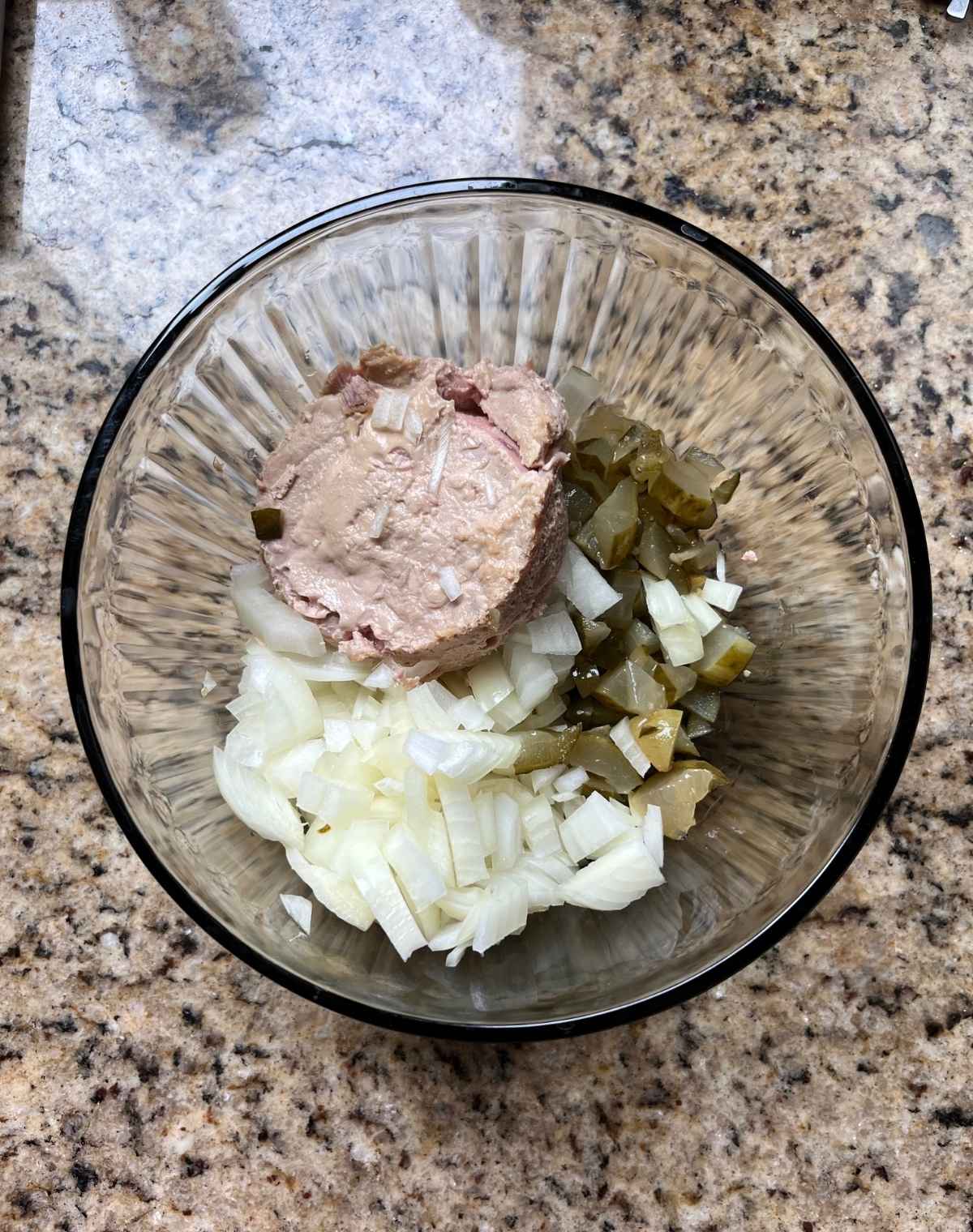 Tuna salad ingredients in a bowl